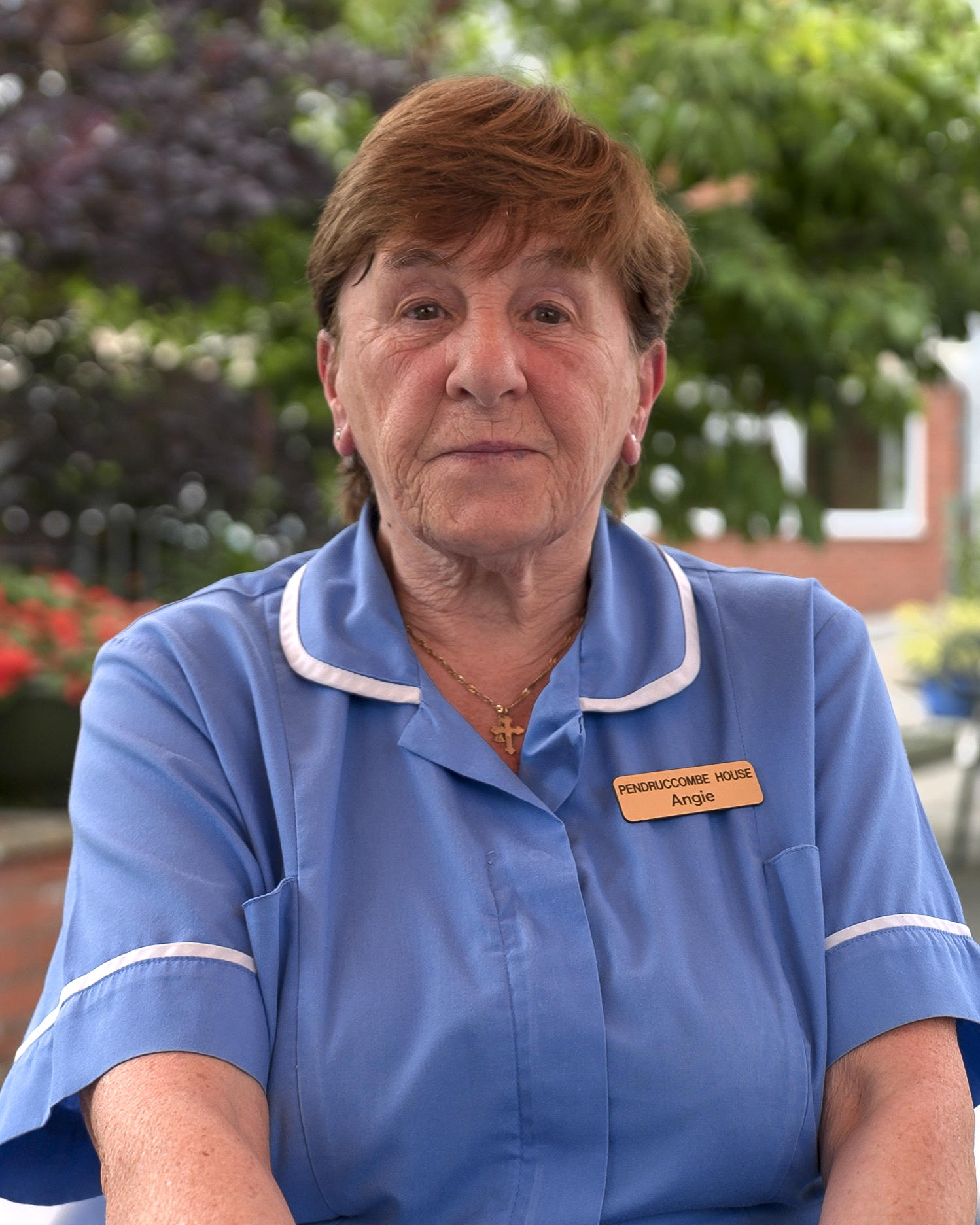 Care worker portrait in uniform